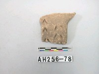 藏品(紅色夾砂陶把殘件)的圖片